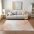 10' X 14' Salmon And Ivory Abstract Washable Indoor Outdoor Area Rug
