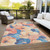 10' X 14' Peach And Blue Floral Washable Indoor Outdoor Area Rug