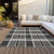 10' X 14' Black Gray And Brown Plaid Washable Indoor Outdoor Area Rug