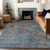 9' X 12' Teal Blue And Brown Abstract Washable Indoor Outdoor Area Rug