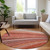 8' Terra Cotta Salmon And Orange Round Striped Washable Indoor Outdoor Area Rug