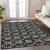 9' X 12' Black And Ivory Floral Washable Indoor Outdoor Area Rug
