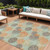 10' X 14' Beige Aqua And Orange Polka Dot Washable Indoor Outdoor Area Rug