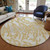8' Gold Gray And Ivory Round Animal Print Washable Indoor Outdoor Area Rug