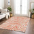 9' X 12' Coral And Ivory Animal Print Washable Indoor Outdoor Area Rug