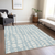 9' X 12' Sky Blue And Ivory Abstract Washable Indoor Outdoor Area Rug
