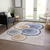 8' X 10' Beige Blue and Gold Faux Bois Washable Non Skid Indoor Outdoor Area Rug