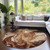 8' Orange Copper And Ivory Round Abstract Washable Indoor Outdoor Area Rug