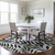 8' Black And Ivory Round Floral Washable Indoor Outdoor Area Rug