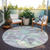 8' Lavender Mint Green And Ivory Round Geometric Washable Indoor Outdoor Area Rug