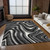 10' X 14' Black Gray And White Abstract Washable Indoor Outdoor Area Rug