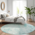 8' Aqua Teal Blue And Ivory Round Floral Washable Indoor Outdoor Area Rug