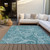 5' X 8' Turquoise And Ivory Paisley Washable Indoor Outdoor Area Rug