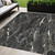 5' X 8' Black Ivory And Gold Abstract Washable Indoor Outdoor Area Rug