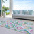 5' X 8' Teal Blue Green And Purple Geometric Washable Indoor Outdoor Area Rug