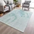 5' X 8' Teal Blue And Pale Aqua Abstract Washable Indoor Outdoor Area Rug