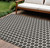 6' X 9' Black And Ivory Geometric Indoor Outdoor Area Rug