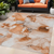 5' X 8' Orange and Ivory Abstract Washable Non Skid Indoor Outdoor Area Rug