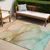 5' X 8' Green and Pink Abstract Washable Non Skid Indoor Outdoor Area Rug