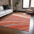 5' X 8' Terra Cotta Salmon And Orange Striped Washable Indoor Outdoor Area Rug