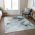 5' X 8' Teal Blue Gold And Gray Abstract Washable Indoor Outdoor Area Rug