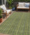 5' X 8' Olive Green And Lime Green Striped Washable Indoor Outdoor Area Rug