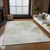 3' X 5' Ivory Beige And Taupe Abstract Washable Indoor Outdoor Area Rug