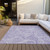 5' X 8' Lavender Purple And Ivory Paisley Washable Indoor Outdoor Area Rug