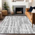 5' X 8' Gray Silver And Ivory Striped Washable Indoor Outdoor Area Rug