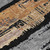 5' X 8' Black Gold And Brown Striped Washable Indoor Outdoor Area Rug