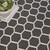 8' Black And Ivory Geometric Indoor Outdoor Area Rug