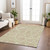 5' X 8' Tan Ivory And Green Abstract Washable Indoor Outdoor Area Rug
