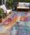 5' X 8' Orange Red And Teal Blue Abstract Washable Indoor Outdoor Area Rug