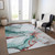 3' X 5' Teal Blue And Terra Cotta Abstract Washable Indoor Outdoor Area Rug