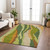5' X 8' Green Beige And Copper Abstract Washable Indoor Outdoor Area Rug