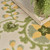 8' X 11' Ivory Green And Yellow Floral Indoor Outdoor Area Rug
