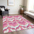 3' X 5' Pink Mauve And Orange Ikat Washable Indoor Outdoor Area Rug