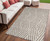 5' X 8' Taupe and Ivory Geometric Washable Non Skid Indoor Outdoor Area Rug