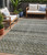 5' X 8' Pewter And Green Striped Washable Indoor Outdoor Area Rug