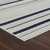 4' X 6' Blue and Cream Striped Distressed Indoor Outdoor Area Rug