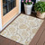 3' X 5' Ivory Beige And Gold Floral Washable Indoor Outdoor Area Rug