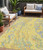 5' X 8' Yellow Purple And Green Abstract Washable Indoor Outdoor Area Rug