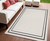 4' X 6' Ivory And Black Indoor Outdoor Area Rug