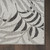 5' X 7' Gray Black And Ivory Palm Leaf Indoor Outdoor Area Rug
