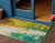 3' X 5' Green And Gold Abstract Washable Indoor Outdoor Area Rug