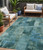 5' X 8' Teal Blue And Pale Aqua Abstract Washable Indoor Outdoor Area Rug