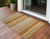 2' X 3' Brown and Orange Striped Washable Non Skid Indoor Outdoor Area Rug