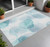 2' X 3' Teal and Ivory Abstract Washable Non Skid Indoor Outdoor Area Rug