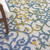 7' X 10' Ivory Blue And Yellow Trellis Indoor Outdoor Area Rug