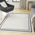 6' X 9' Ivory And Black Indoor Outdoor Area Rug